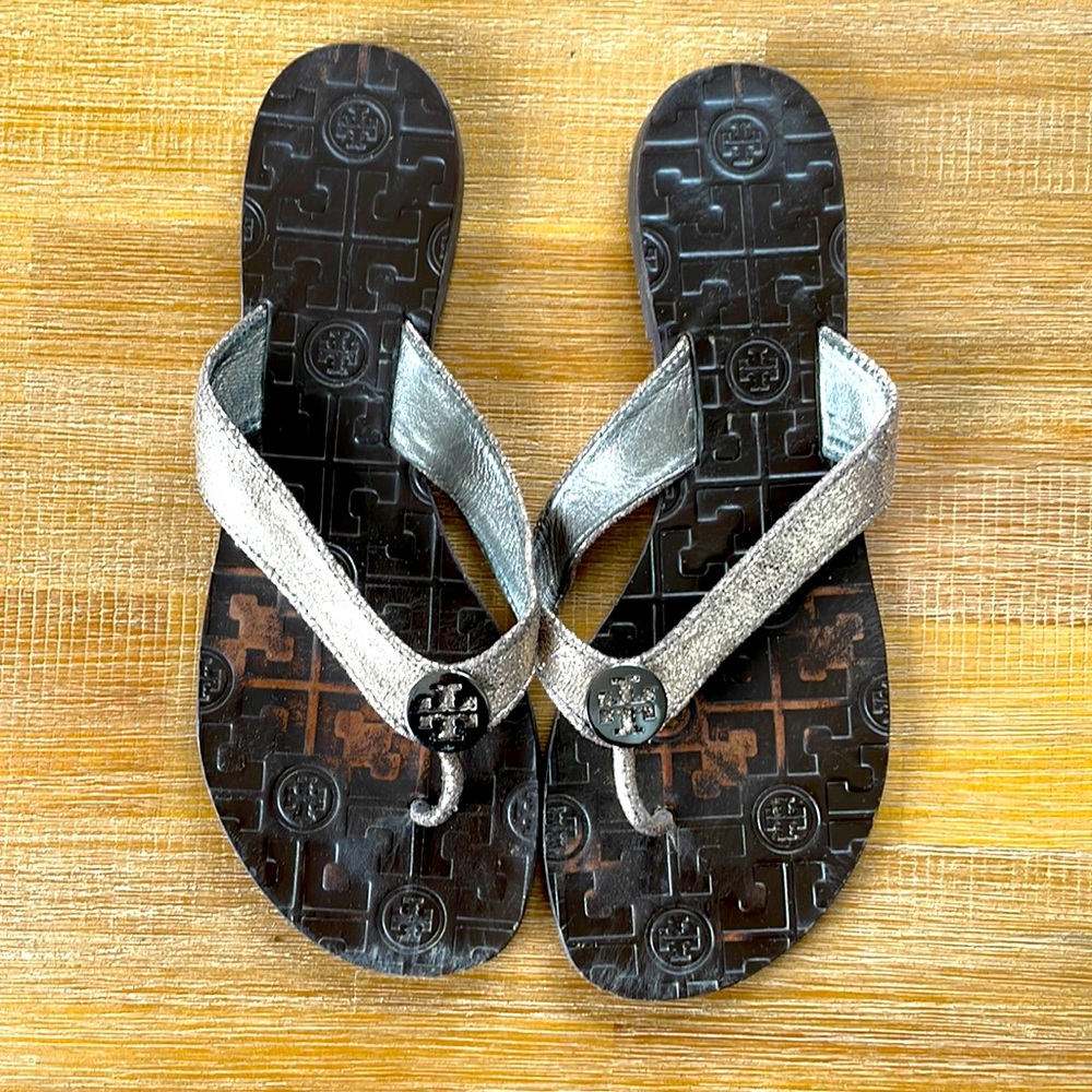 Tory Burch leather flip flops.